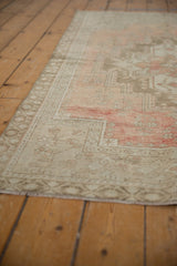 Soft rose and beige-silver aged patina texture of a distressed Oushak rug.