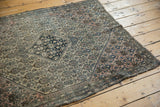 Fine weave and soft wool of the antique Farahan Sarouk rug, with blossomed henna plant motif and ivory, navy, rose tones.