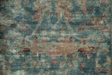 Distressed Mahal runner's texture showing visible foundation and faded blue-red florals.