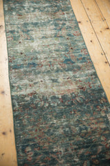 Distressed Mahal runner pile with worn knot heads and visible foundation.