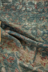 Distressed Persian Mahal runner texture, with worn dusty blue and red floral motifs.