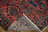 Visible knot heads and hand-knotted weave on the back of the vintage Lilihan rug.