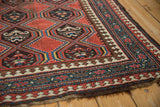 Antique Caucasian runner border with reciprocating pawn motif, mallard green, and madder red.