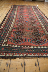 Antique Caucasian runner: ivory, mallard green, navy pawn motif border, madder red field.