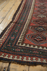 Antique Caucasian runner. Reciprocating pawn border, geometric pattern. Red, green, blue, brown hues, even wear.