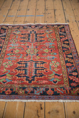 Fringe and restored outer minor border of the antique Heriz rug, with brick red field.