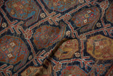 Afshar rug detail: repeating boteh motif within lattice panels, featuring indigo, brick red, and saffron.