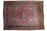 Vintage Persian Doroksh carpet, vibrant ruby red starburst medallion, sapphire blue field.
