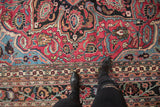 Vintage Doroksh carpet's ruby red field with sprawling vinery, sapphire blue, and traditional borders.