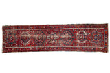 Hand-knotted vintage Karaja rug runner with geometric medallions in cherry red and navy, 2'5