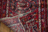 Polychrome side selvage and hand-knotted foundation of the vintage Karaja runner rug.