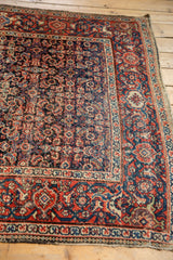 Antique Persian Fereghan carpet, intricate navy and brick red Herati motif, mostly even wear.