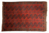 Antique Ersari hand-knotted carpet, chestnut red field with navy blue triple column gul motifs.
