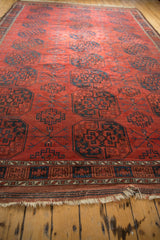 Antique Ersari carpet: navy geometric gul, chestnut red Tree of Life motifs, and fringe.