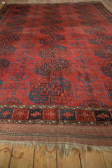 Antique Ersari carpet, repeating navy gul motifs, delicate teal vines on chestnut red.