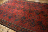 Antique Ersari carpet corner detail, chestnut red guls, dusty dark teal Tree of Life border.