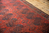 Antique Ersari carpet's chestnut red triple gul pattern and continuous Tree of Life border.