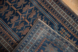 Hand-knotted reverse of the vintage Oushak rug revealing a dusty navy tree-of-life pattern.