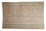 Distressed Oushak carpet featuring an allover pale apricot floral design with time-softened texture, 6' x 9'2