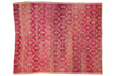Distressed vintage Oushak carpet, raspberry fuchsia with ivory trellis, abrashed ground.