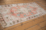 Playful floral border with stepped spandrel overlay and faded cherry red field tones.