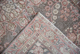 Textured distressed Sparta rug pile, revealing exposed foundation and dense hand-knotted back.