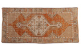 Vintage distressed Oushak rug runner with terracotta, silver, ivory stepped medallion, 2'5