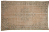 Distressed Vintage Oushak carpet with worn starburst medallion, trefoil finials, and palmette vine border. Ivory, seafoam.