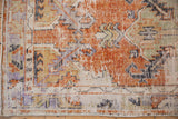 Distressed terracotta and ivory Oushak runner pile, showing worn primitive floral motifs and foundation.