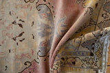 Distressed vintage Oushak rug runner pile texture, with faded mauve, ivory, and blue floral details.