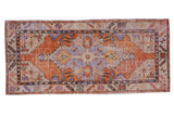 Distressed vintage Oushak runner with faded orange medallion, soft blue, ivory, charcoal floral motifs, 2'7