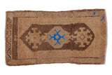 Vintage Distressed Oushak rug mat, geometric brown medallion with vibrant blue, abrash, short pile.