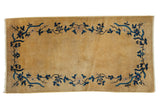 Hand knotted Art Deco runner, gold field with cobalt blue floral vinery.