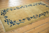 Vintage Art Deco runner corner, gold field with cobalt blue floral vinery and secure side cording.
