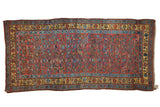 Vintage Kurdish Bijar rug runner, allover spiraled floral, brick red, gem tones, saffron yellow border.