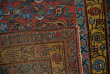 Kurdish Bijar rug corner, even wear showing faint foundation, spiraled pattern, saffron border.