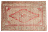 Vintage Distressed Oushak carpet with stepped medallion design in raspberry and beige.