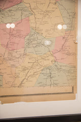 Lower right detail of the antique Bedford NY map showing aged paper with a visible tear.