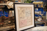 Antique Katonah business directory in black frame, detailing the top right section and aged paper.
