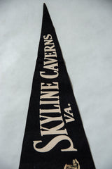 Vintage black felt pennant showing cream 