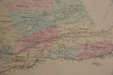 Detailed central section of an antique Mansfield map showing hand-colored districts.