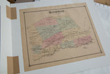 An antique map of Mansfield, New Jersey, attached to a white mat board.