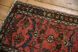 Lilihan rug corner, dusty raspberry red, sapphire blue palmettes, delicate vinery.