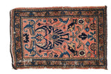 Vintage Persian Lilihan rug mat, faded raspberry field, cobalt blue palmettes, and patterned borders.