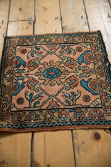 Vintage Lilihan rug corner detail, dusty rose field, sapphire blue, oxidized green floral vinery.