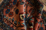 Hand-knotted pile details on vintage Lilihan rug, with dusty rose, wine, and sapphire florals.