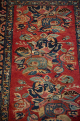 Vintage Hamadan rug detail with Karabagh floral bouquets, meandering vines, and palmette borders.