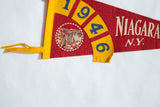 Red felt Vintage 1946 Niagara Falls banner showing waterfall graphic and date.