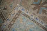 Distressed Soumac runner with geometric bird and plant border motifs in muted blue and brown.