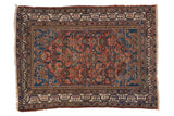 Vintage hand-knotted Malayer rug with madder red Herati field, indigo spandrels, pawn motif borders.